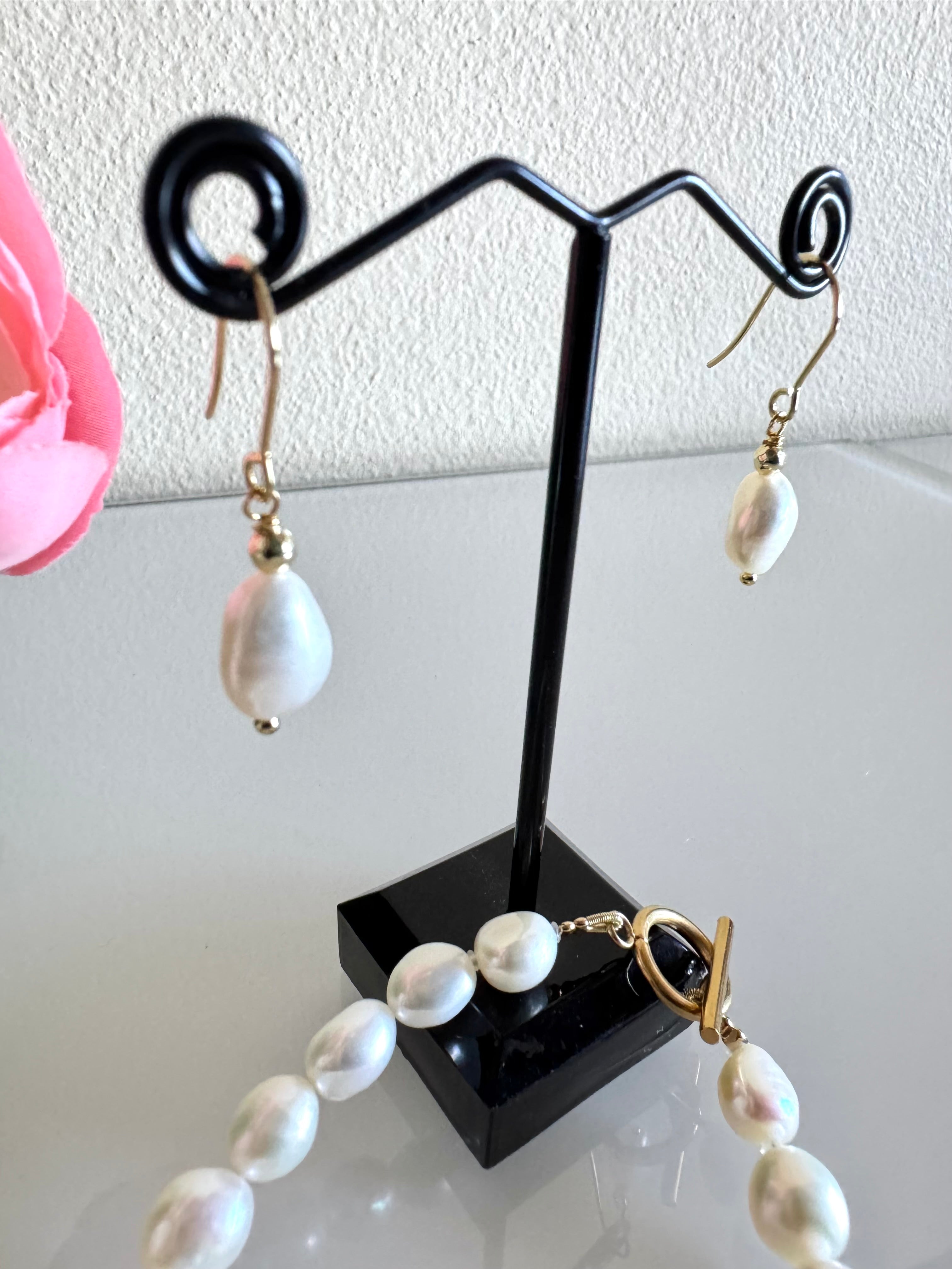 Freshwater baroque pearl bracelet and a pair of matching earrings with surgical stainless gold settings
