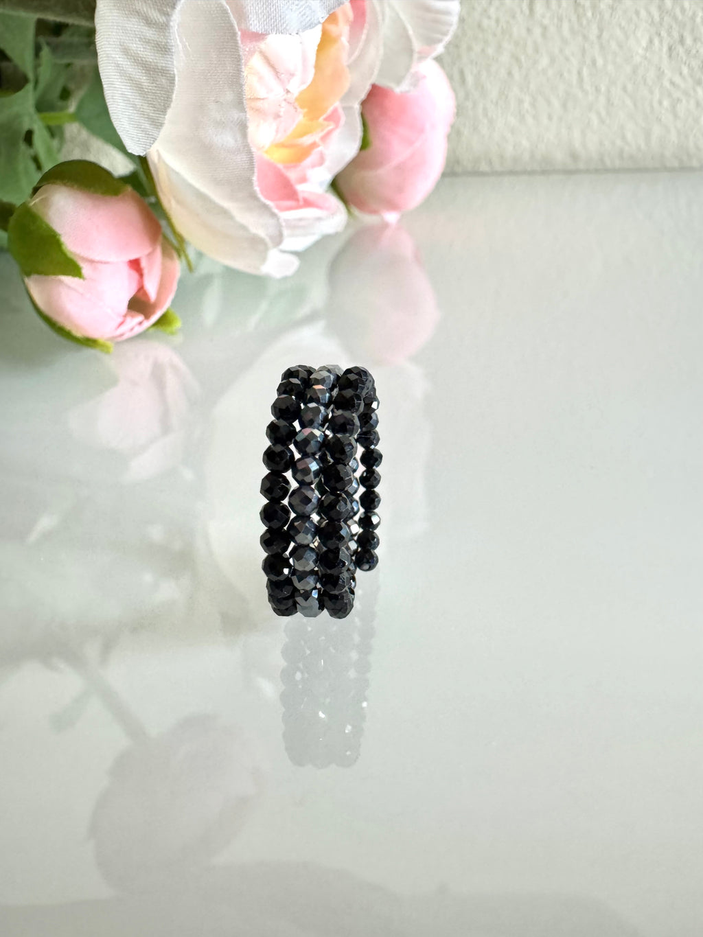 Black spinel and herahertz stone (faceted) free size memory wire ring