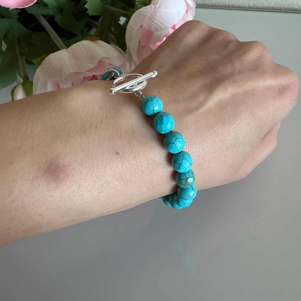 Howlite bracelet with sterling silver OT clasps and stainless chain bracelet