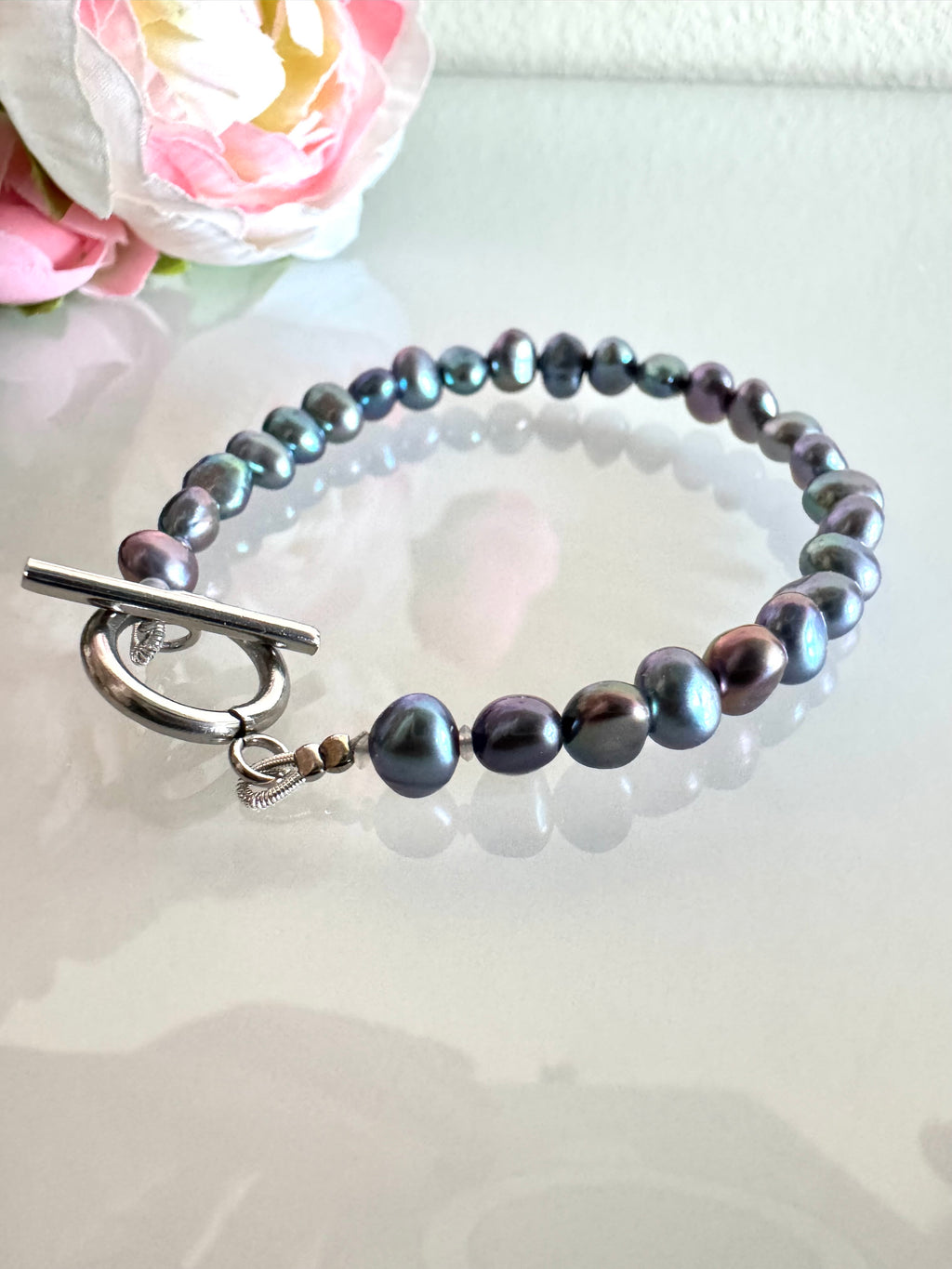 Freshwater black free form pearl bracelet with surgical stainless settings