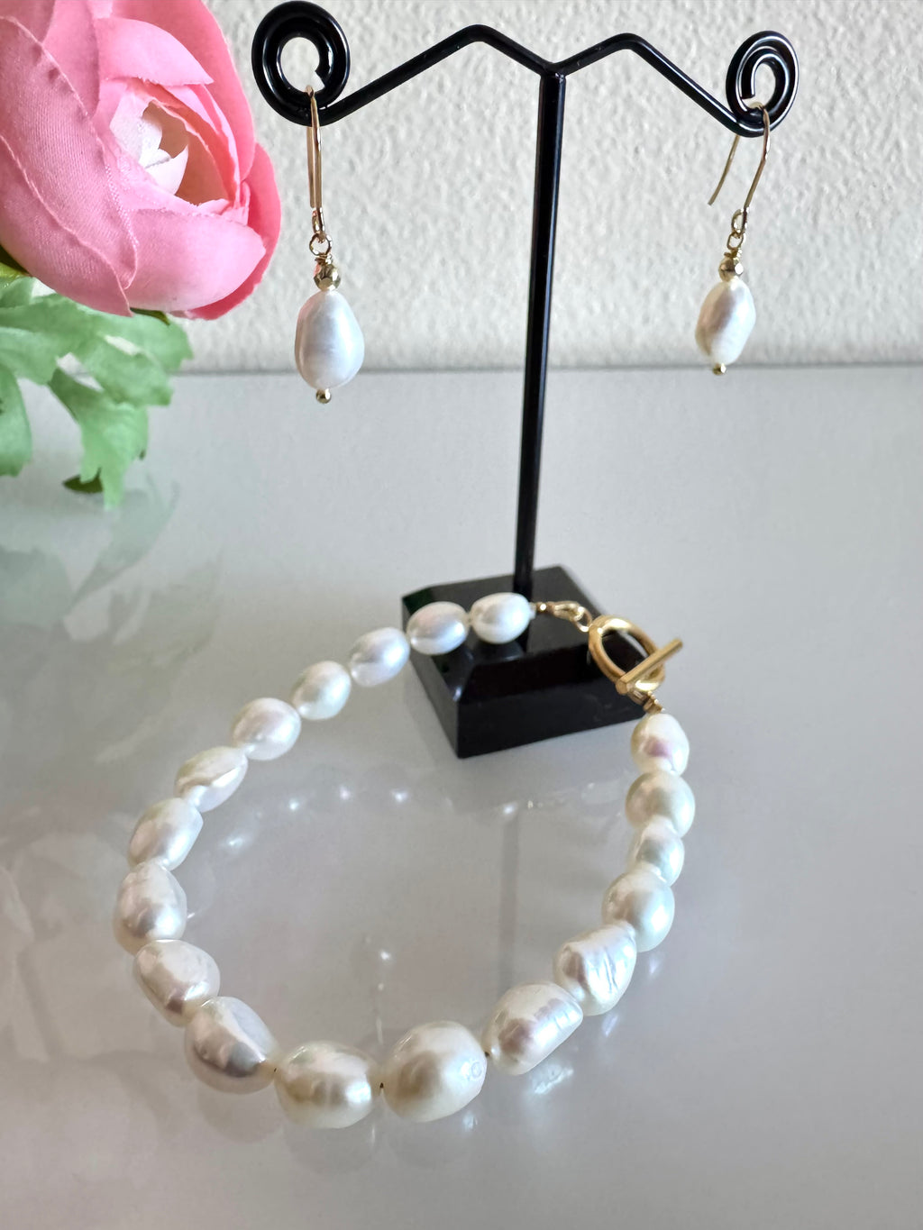 Freshwater baroque pearl bracelet and a pair of matching earrings with surgical stainless gold settings