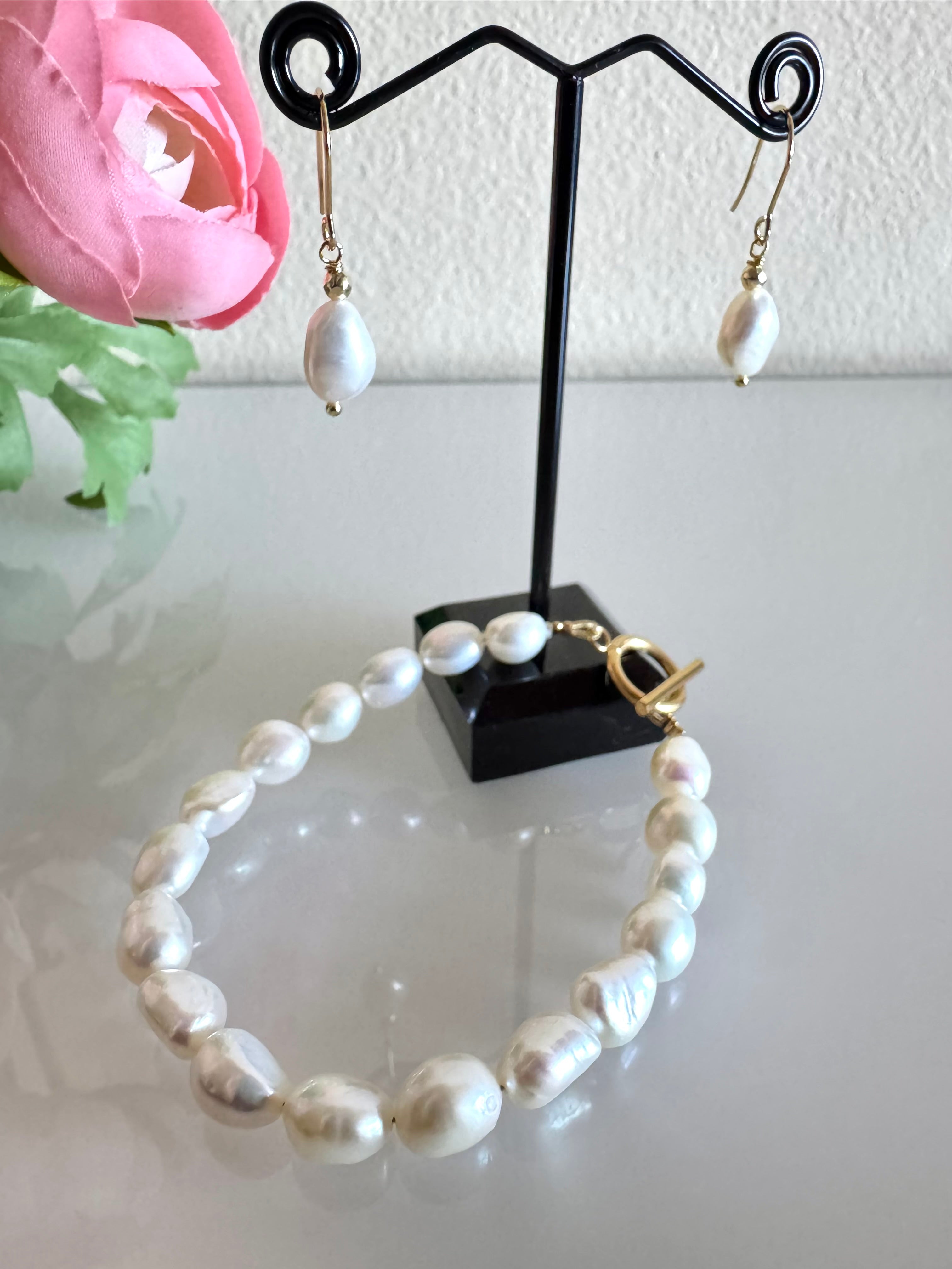 Freshwater baroque pearl bracelet and a pair of matching earrings with surgical stainless gold settings
