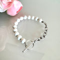 Howlite bracelet with starling silver clasps and stainless steel chain bracelet