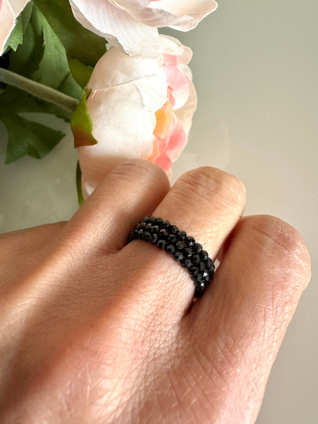 Black spinel (faceted) free size memory wire ring
