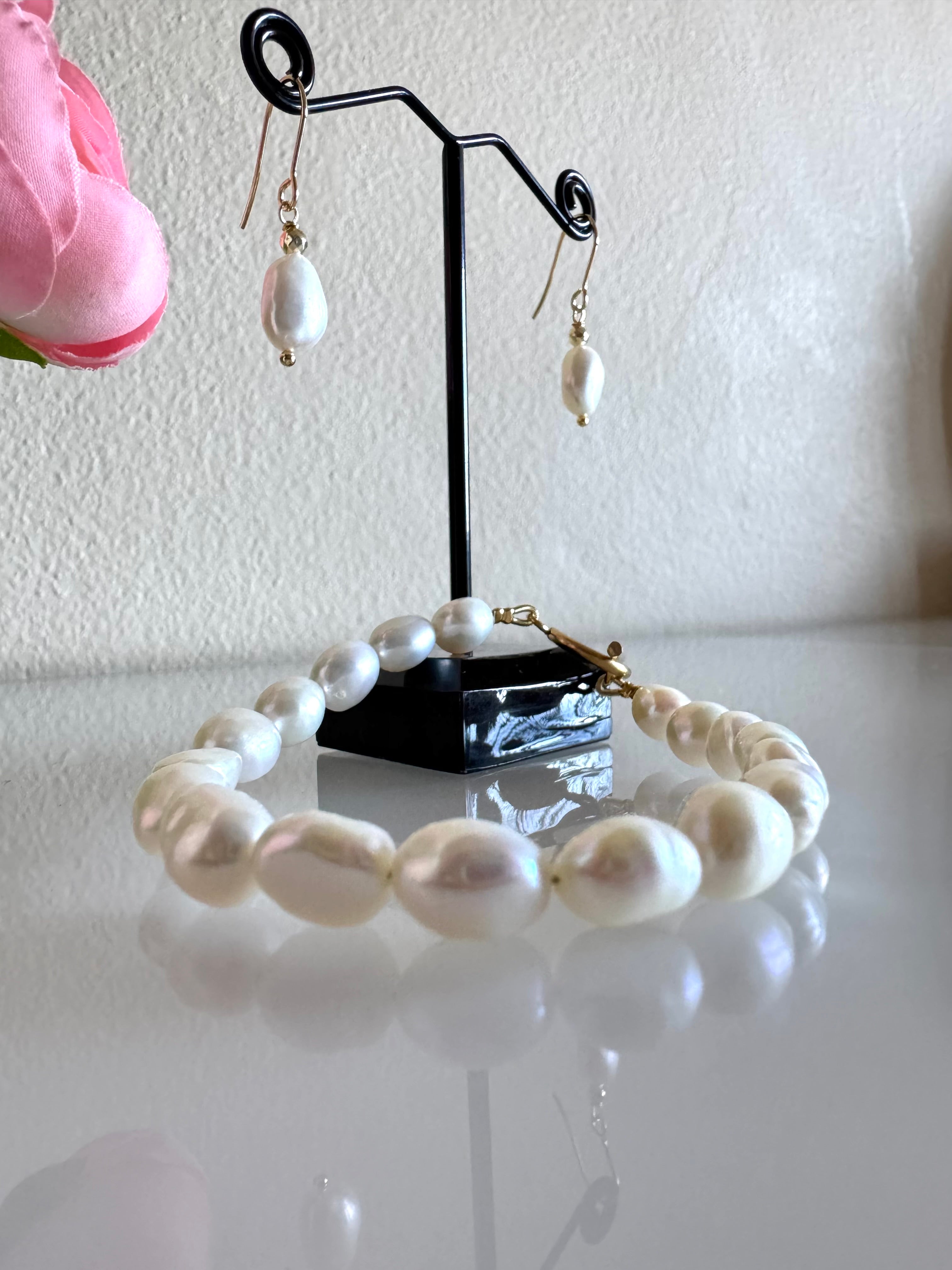 Freshwater baroque pearl bracelet and a pair of matching earrings with surgical stainless gold settings