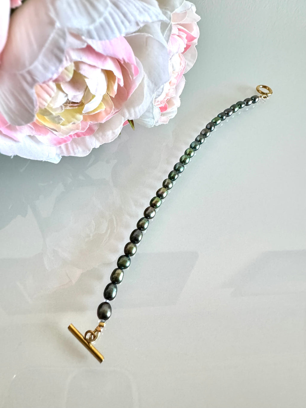 Freshwater oval shape black pearl bracelet with surgical stainless gold clasps