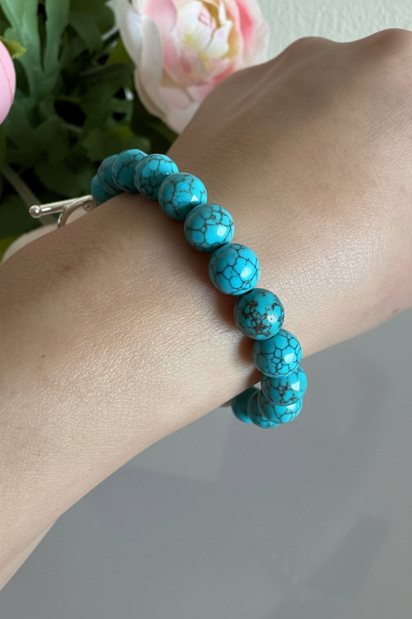 Howlite bracelet with sterling silver OT clasps and stainless chain bracelet
