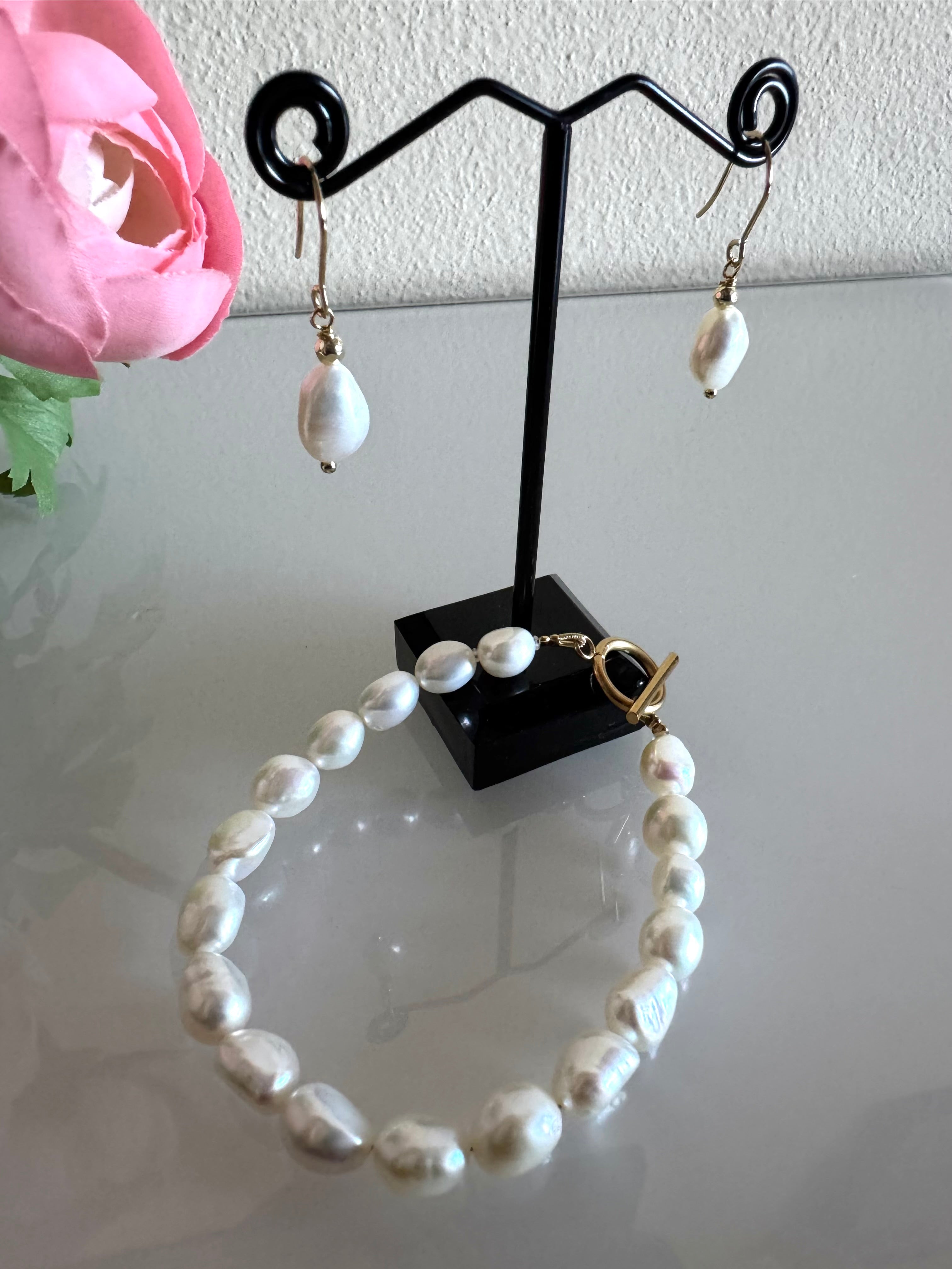 Freshwater baroque pearl bracelet and a pair of matching earrings with surgical stainless gold settings