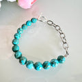 Howlite bracelet with sterling silver OT clasps and stainless chain bracelet
