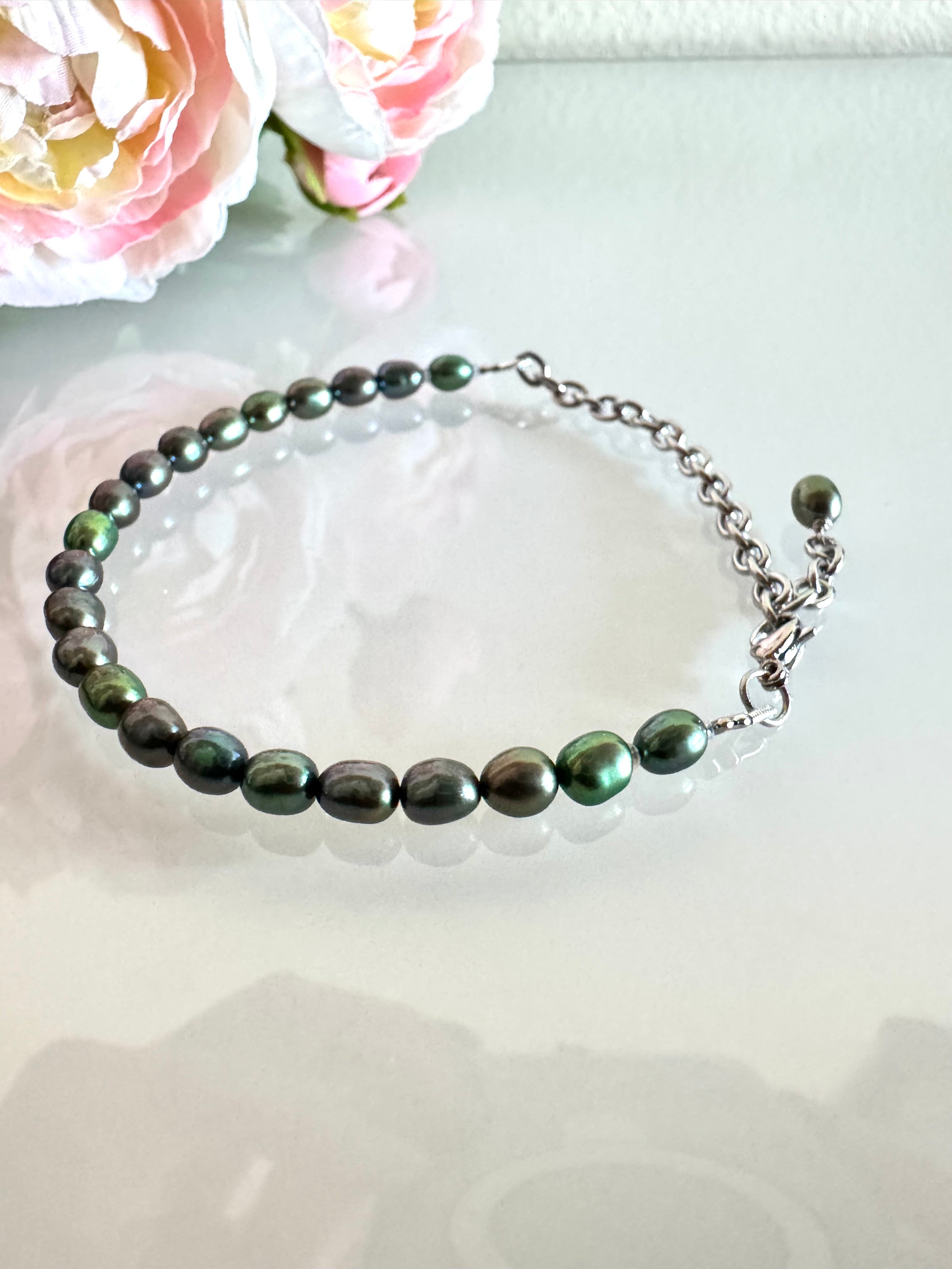 Freshwater oval shape black pearl bracelet with surgical stainless chain &clasps