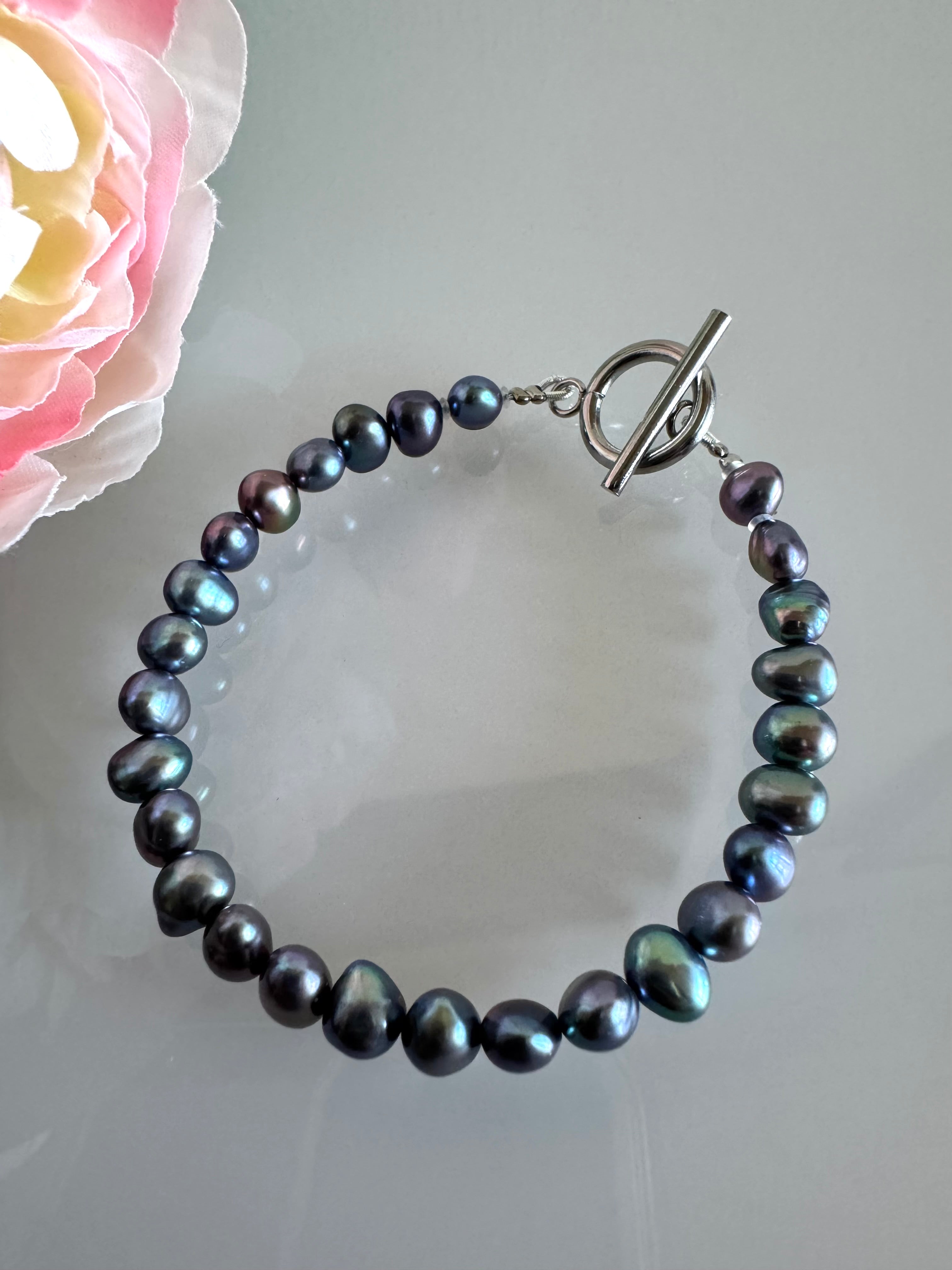 Freshwater black free form pearl bracelet with surgical stainless settings