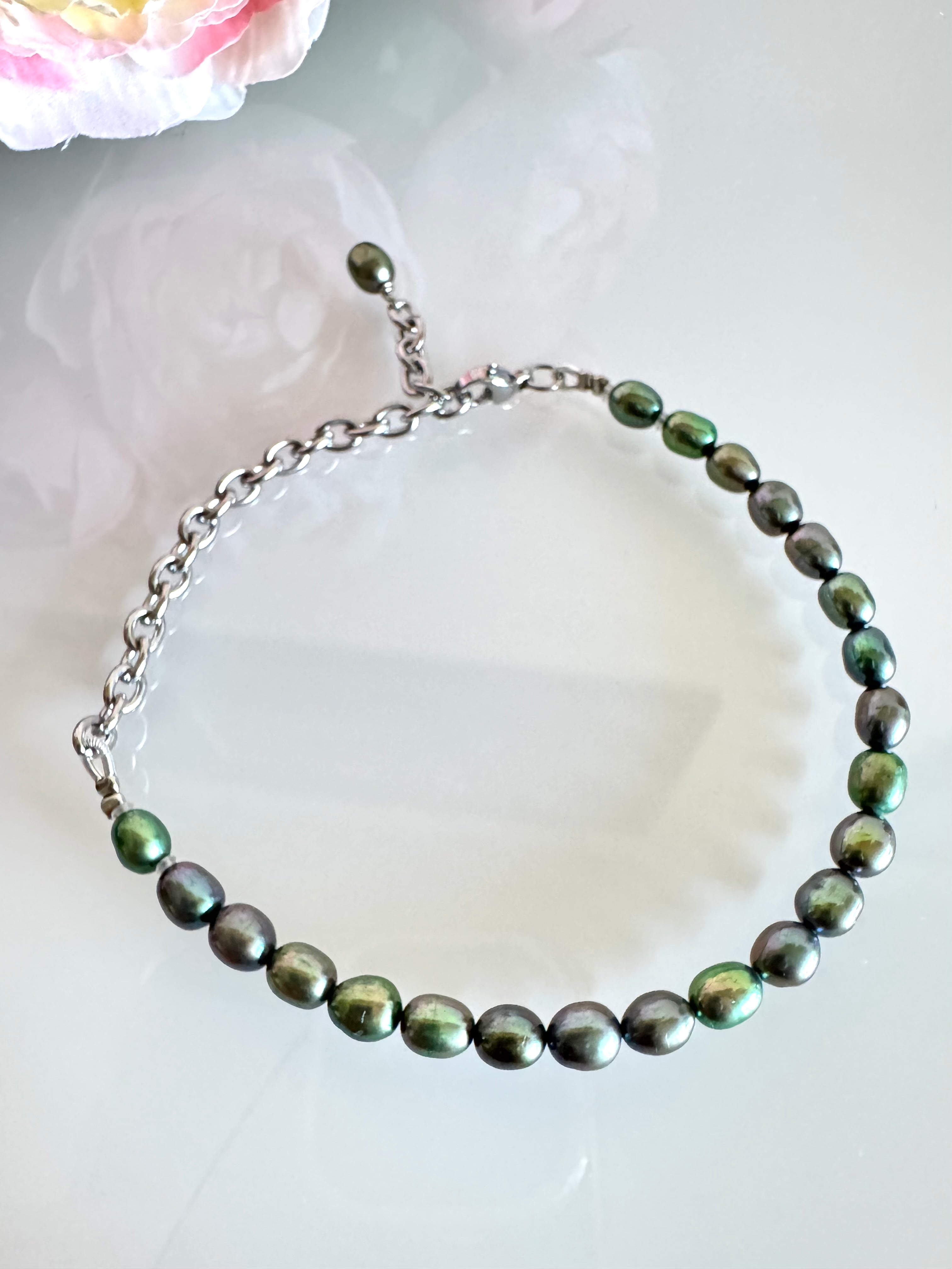 Freshwater oval shape black pearl bracelet with surgical stainless chain &clasps