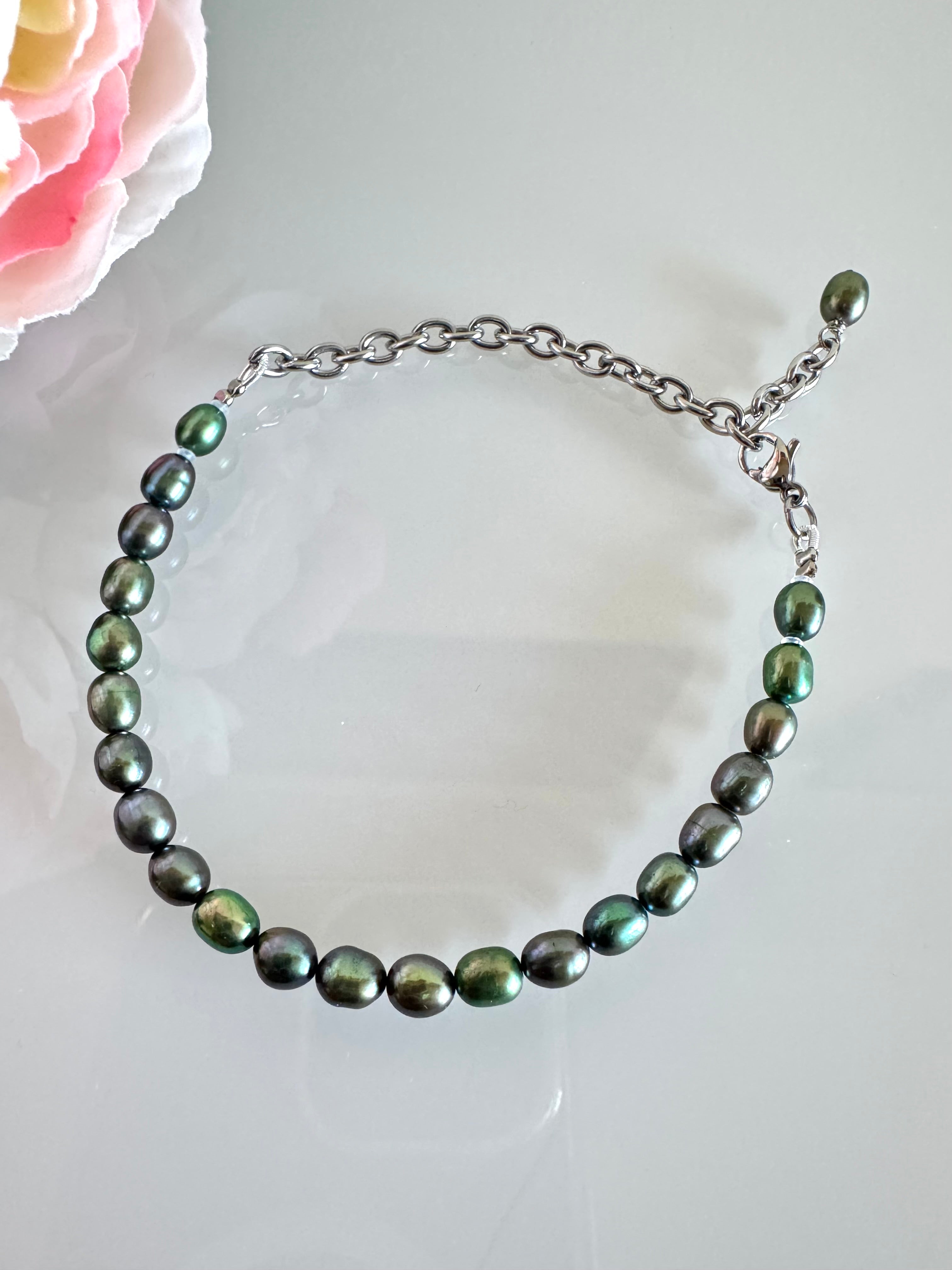 Freshwater oval shape black pearl bracelet with surgical stainless chain &clasps
