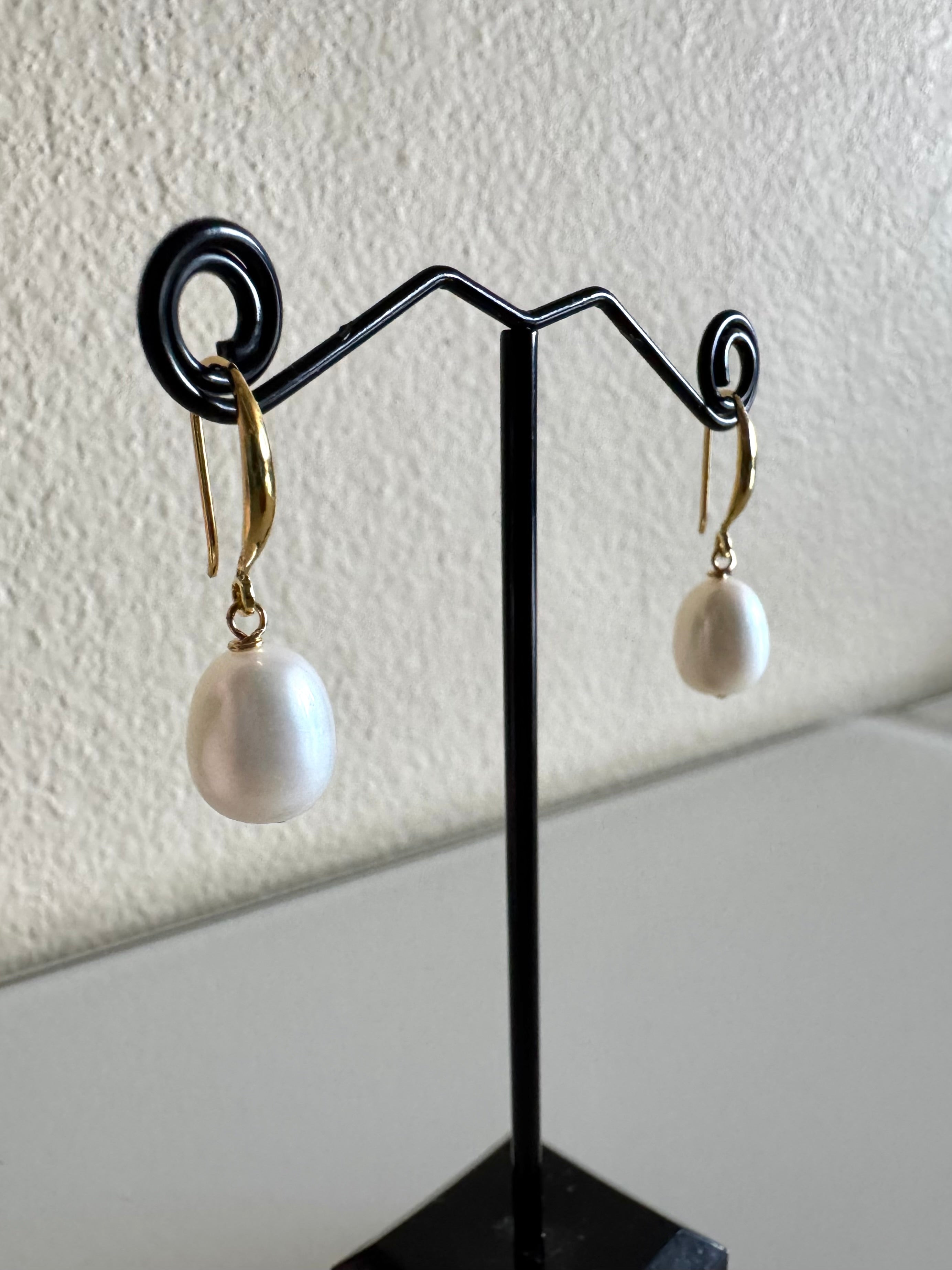 Freshwater pearl earrings with sterling silver gold plated settings