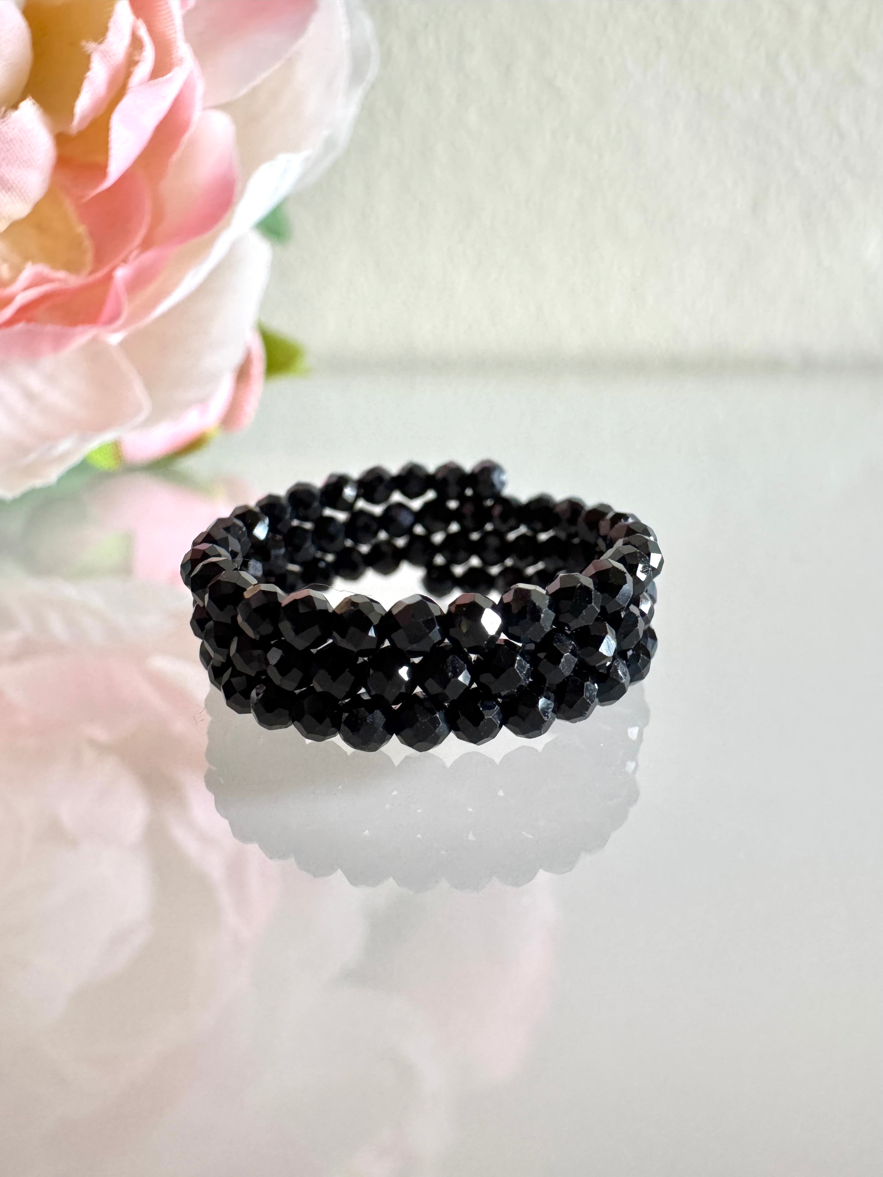 Black spinel (faceted) free size memory wire ring