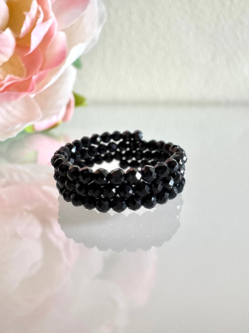 Black spinel (faceted) free size memory wire ring
