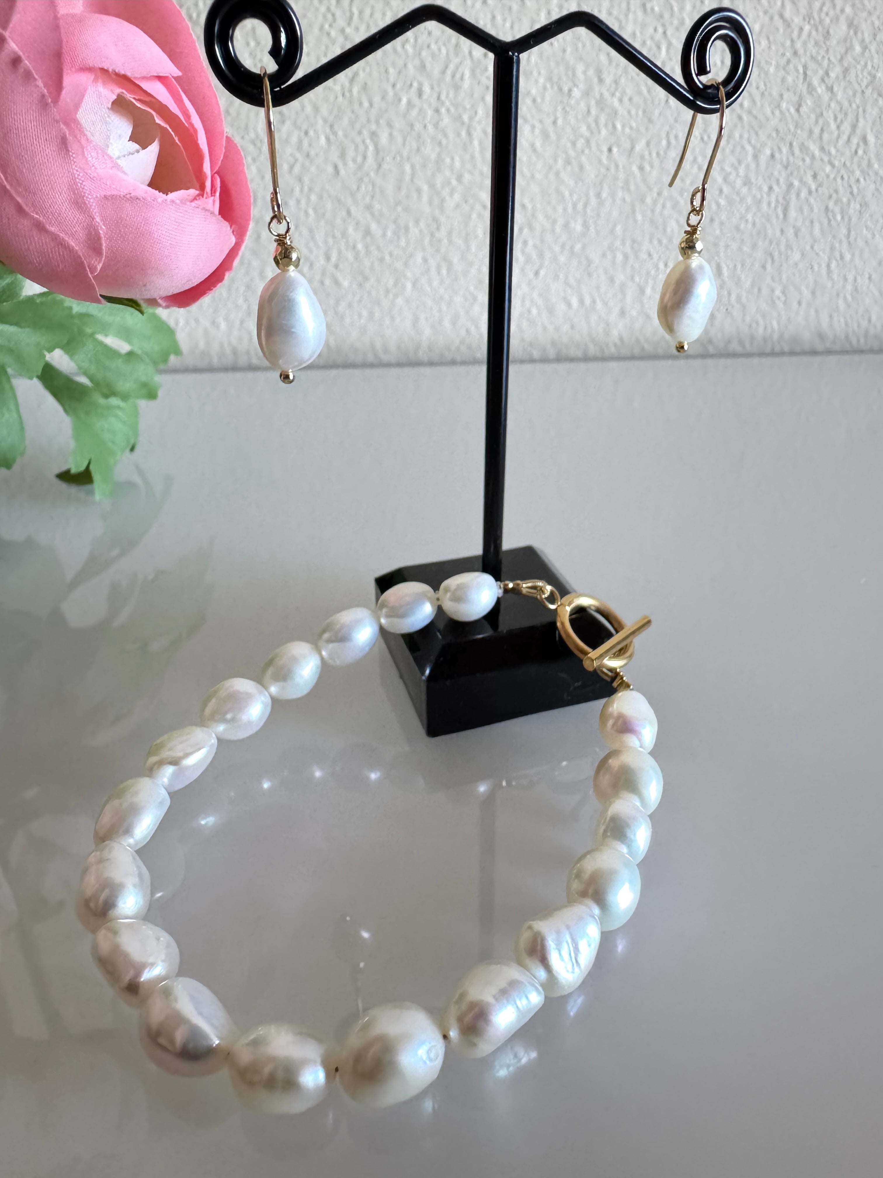 Freshwater baroque pearl bracelet and a pair of matching earrings with surgical stainless gold settings