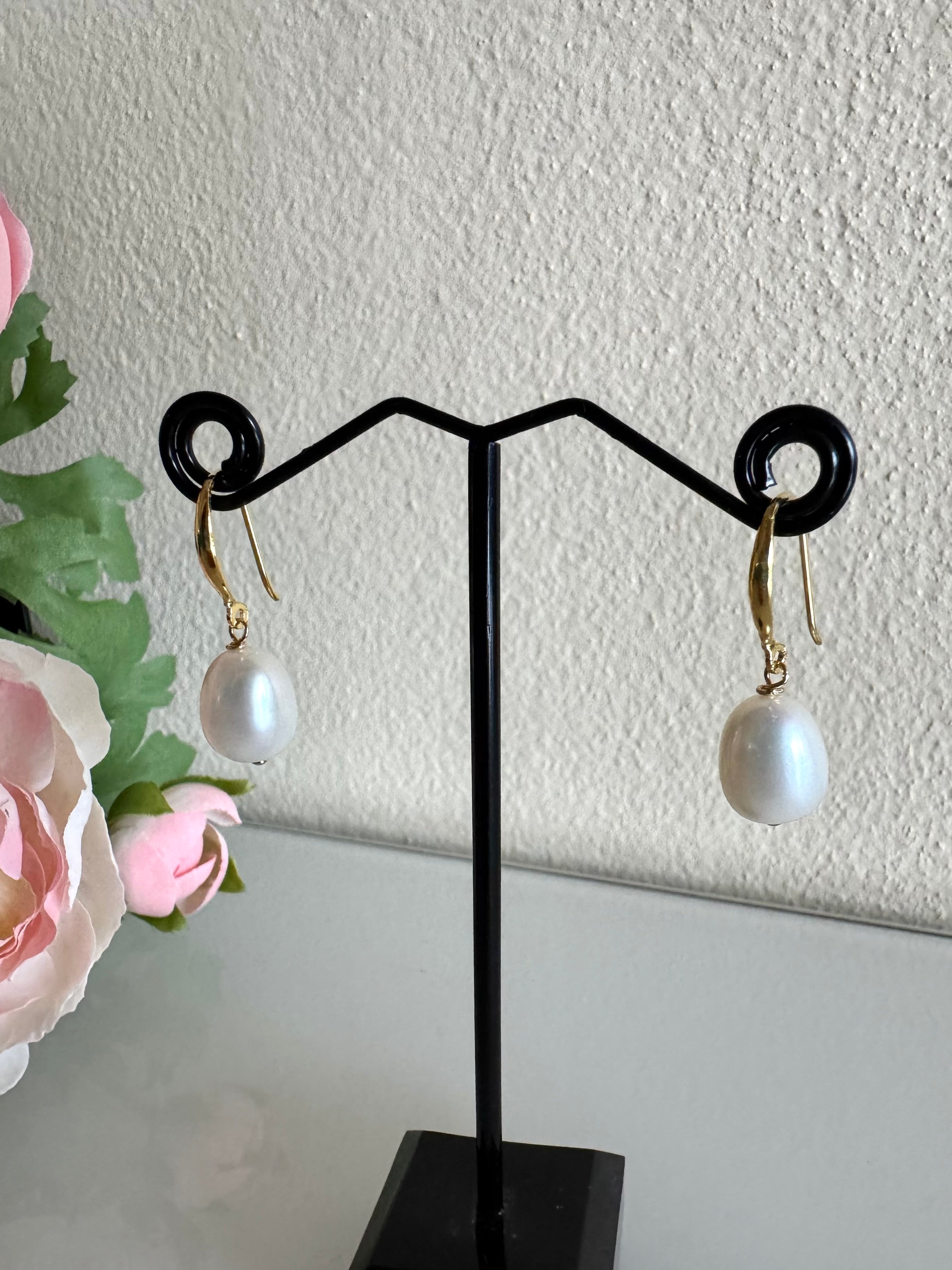 Freshwater pearl earrings with sterling silver gold plated settings