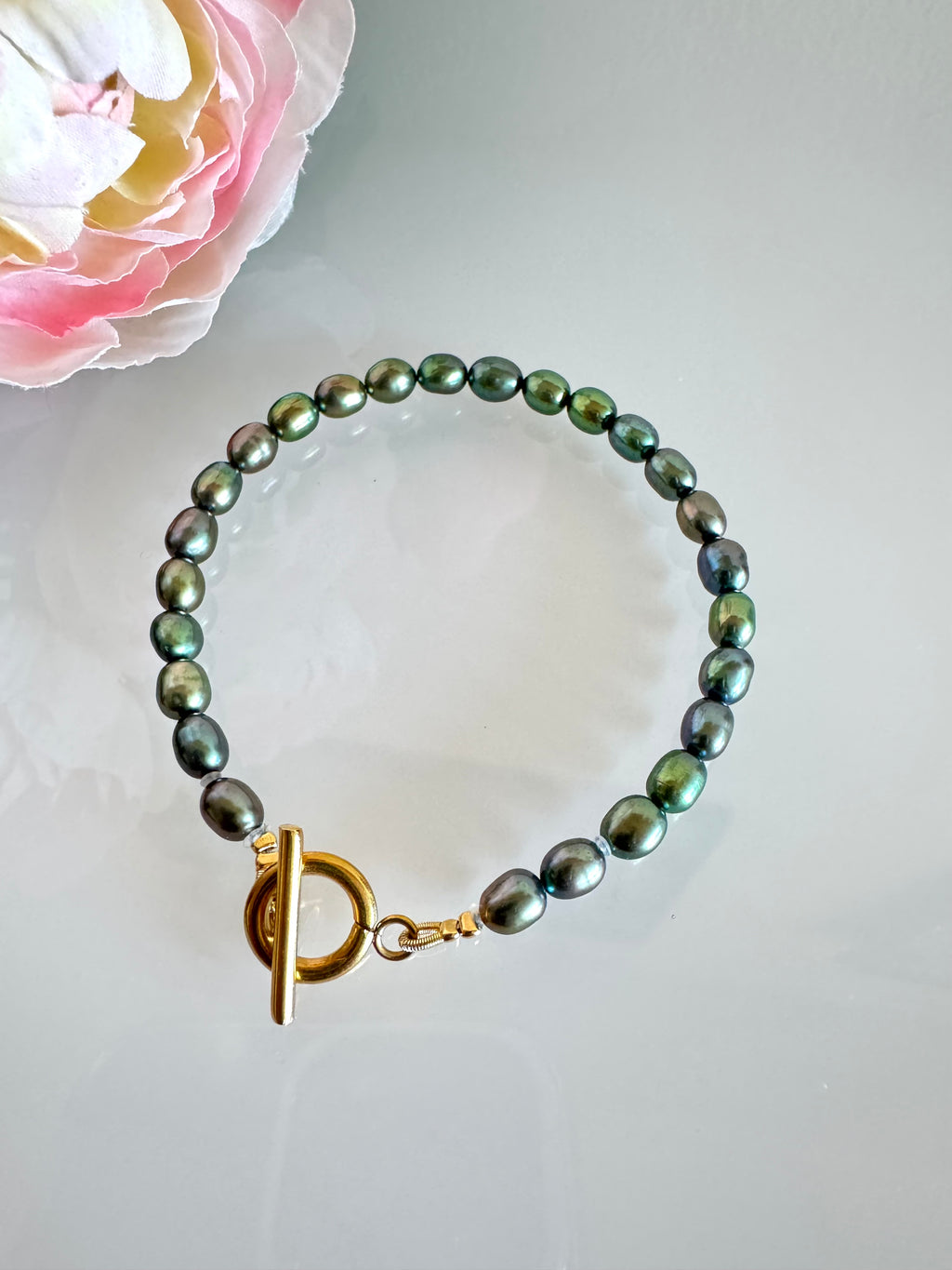 Freshwater oval shape black pearl bracelet with surgical stainless gold clasps