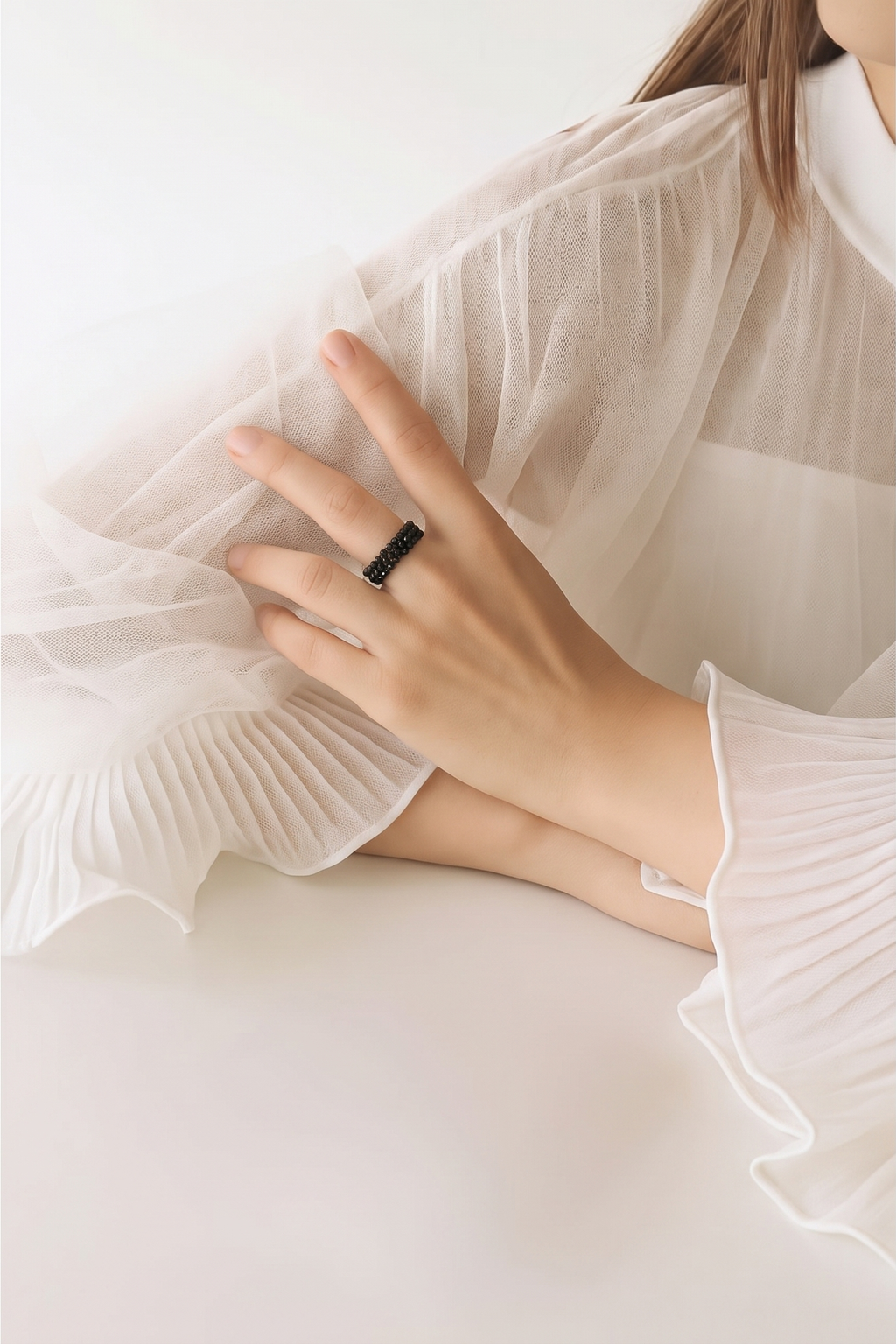 Black spinel (faceted) free size memory wire ring