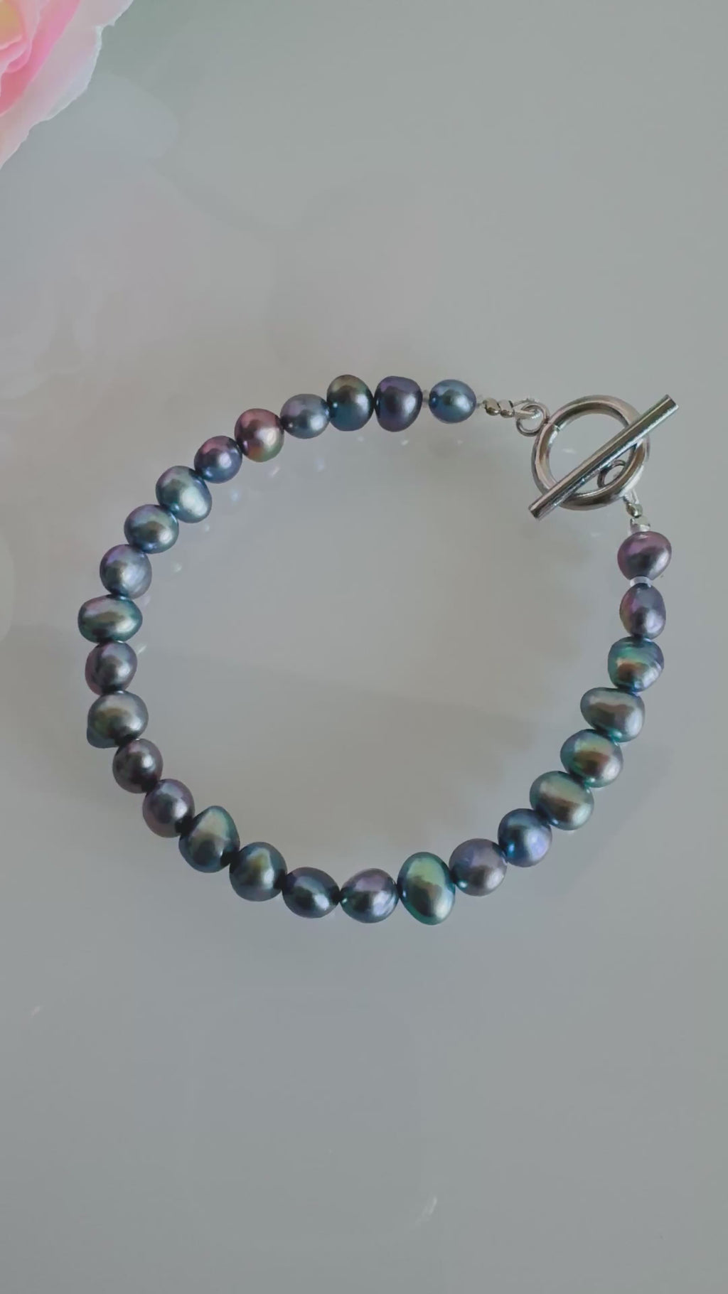 Freshwater black free form pearl bracelet with surgical stainless settings